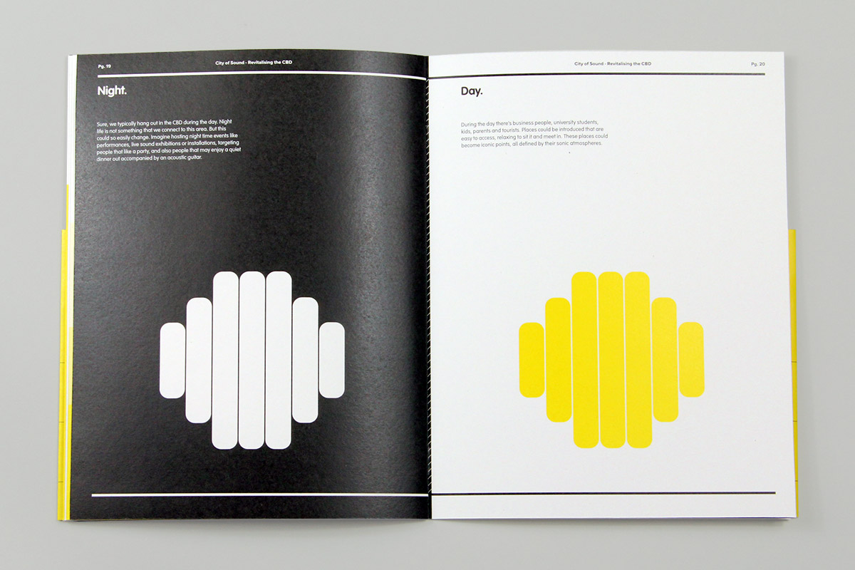 Open booklet with a black left page titled 'Night.' featuring a white sound wave graphic, and a white right page titled 'Day.' featuring a yellow sound wave graphic.
